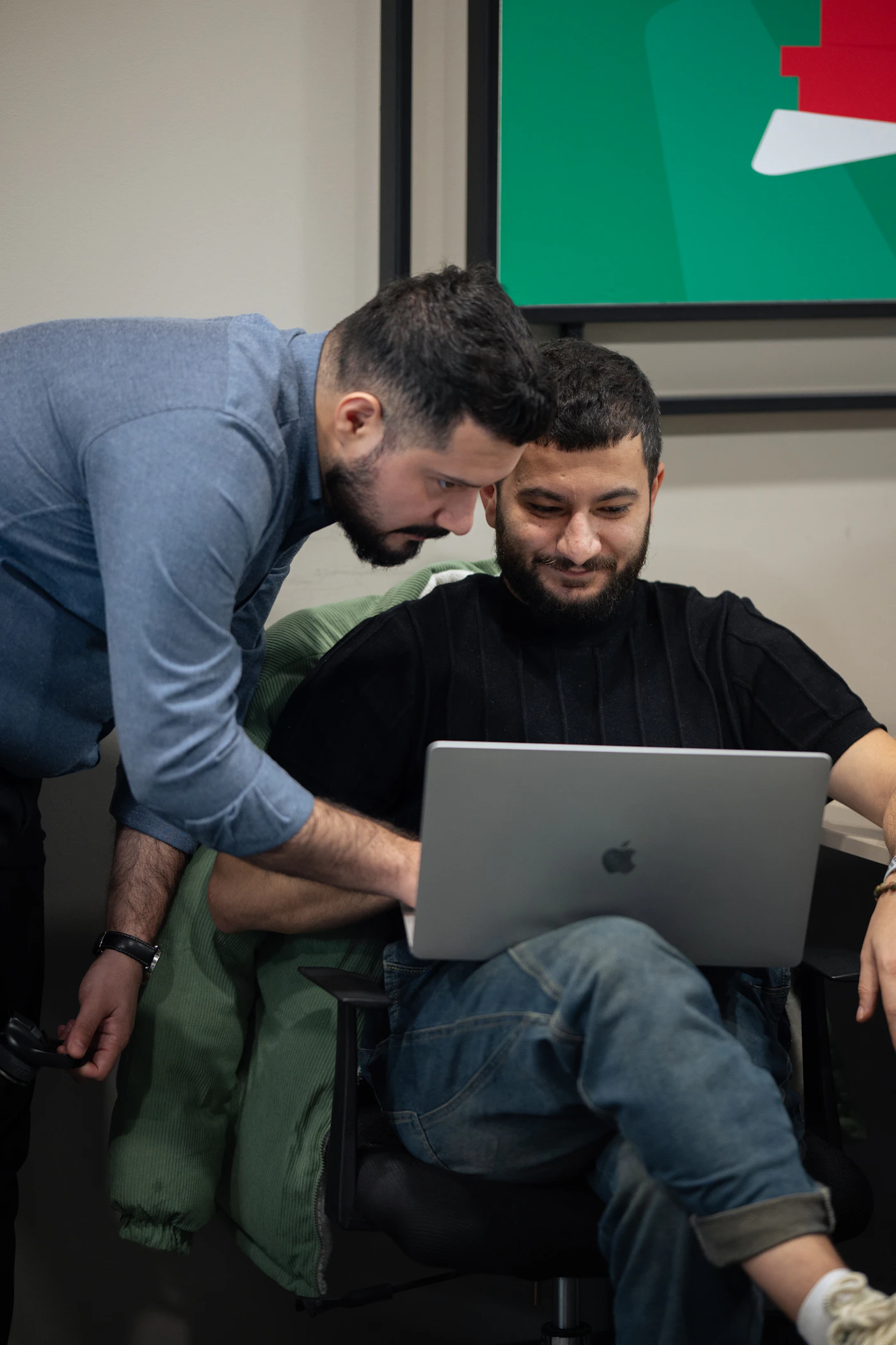 Two developers reviewing a website build together