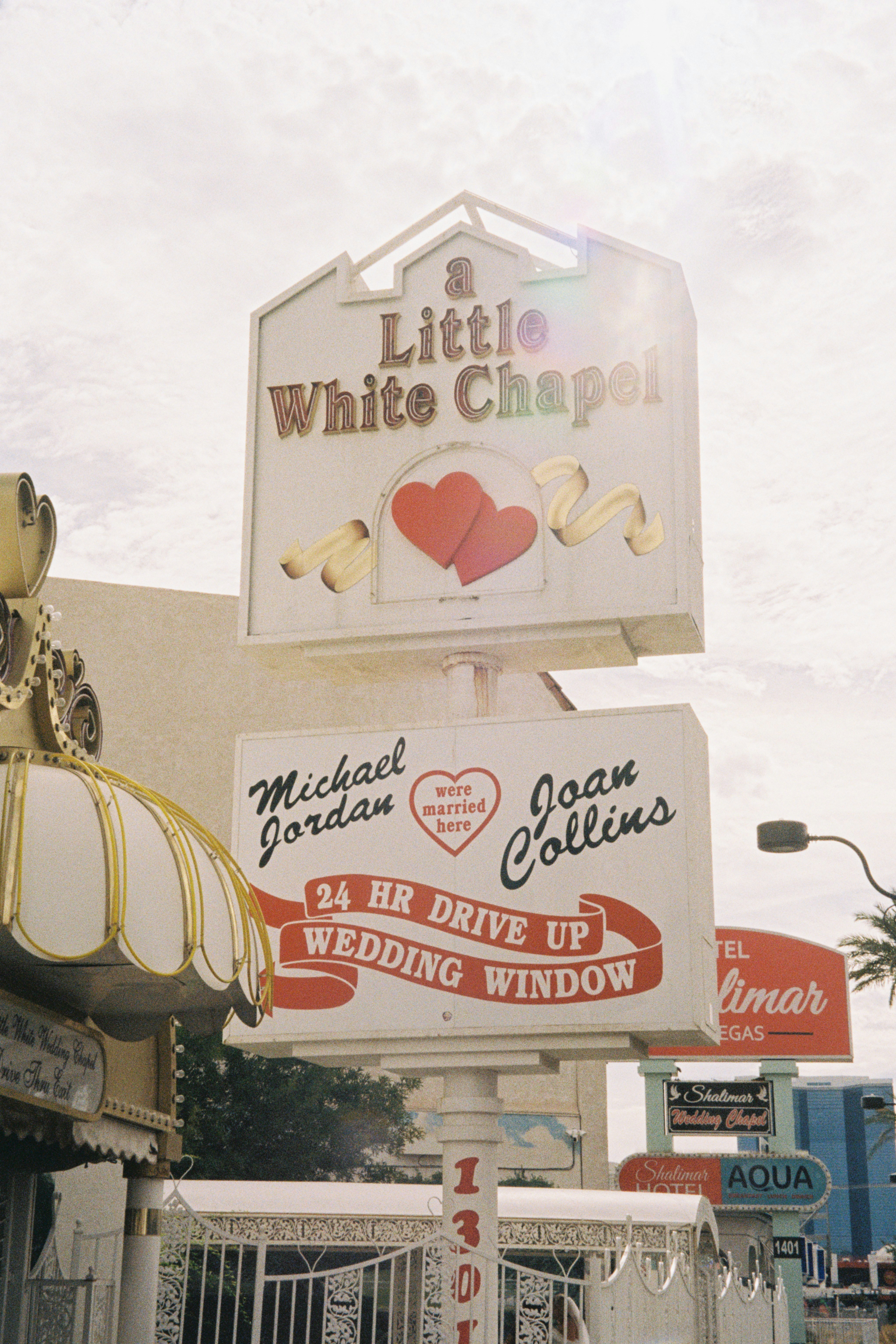A couple of signs that are on the side of a building