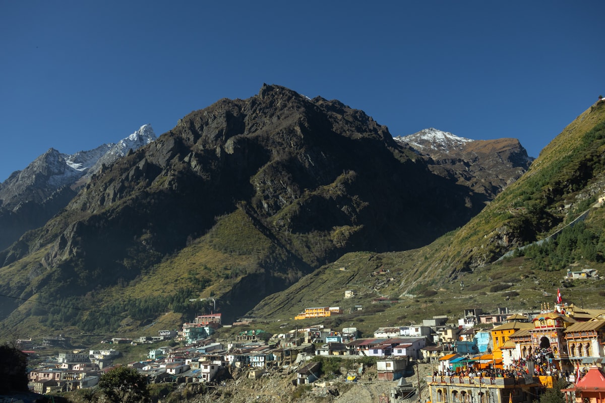 Badrinath Dham temple set against snow-capped Himalayan peaks