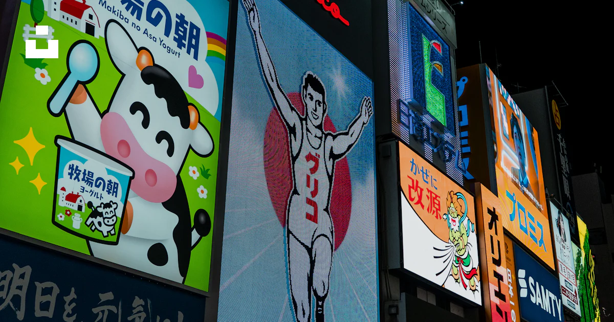 Advertisements With Large Numbers Examples A large number of advertisements on the side of a building photo – Free ...