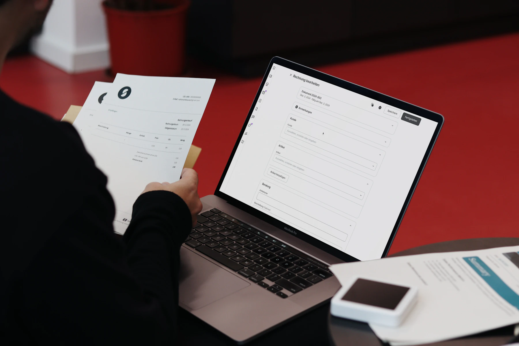 Client operations professional reviewing an invoice and digital service record