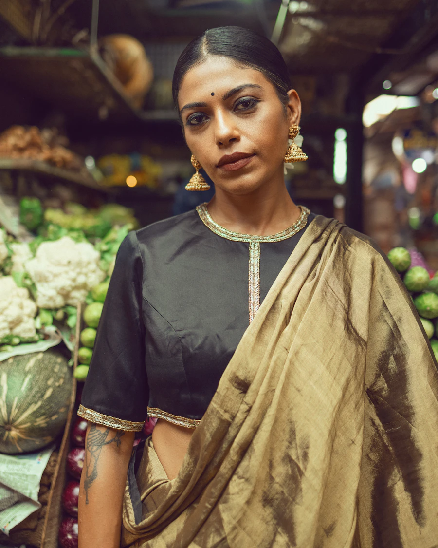 An Indian shopper at a colourful market stall
