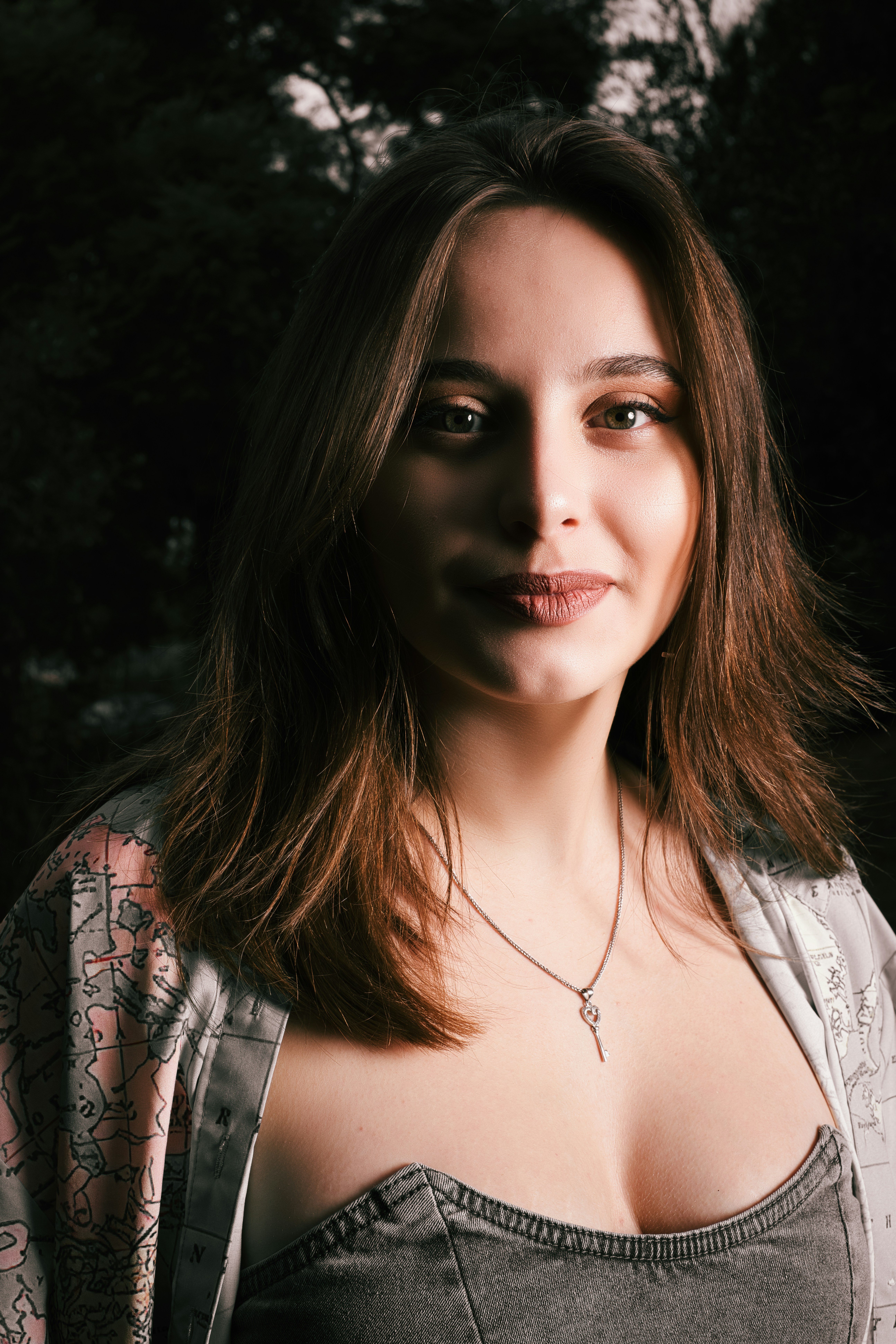 A woman with big breast posing for a picture