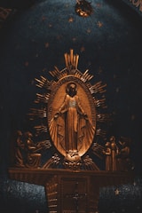 A statue of the virgin mary in a church