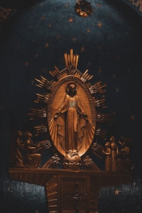 A statue of the virgin mary in a church