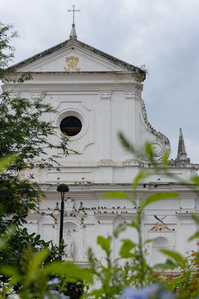 A large white church with a clock tower