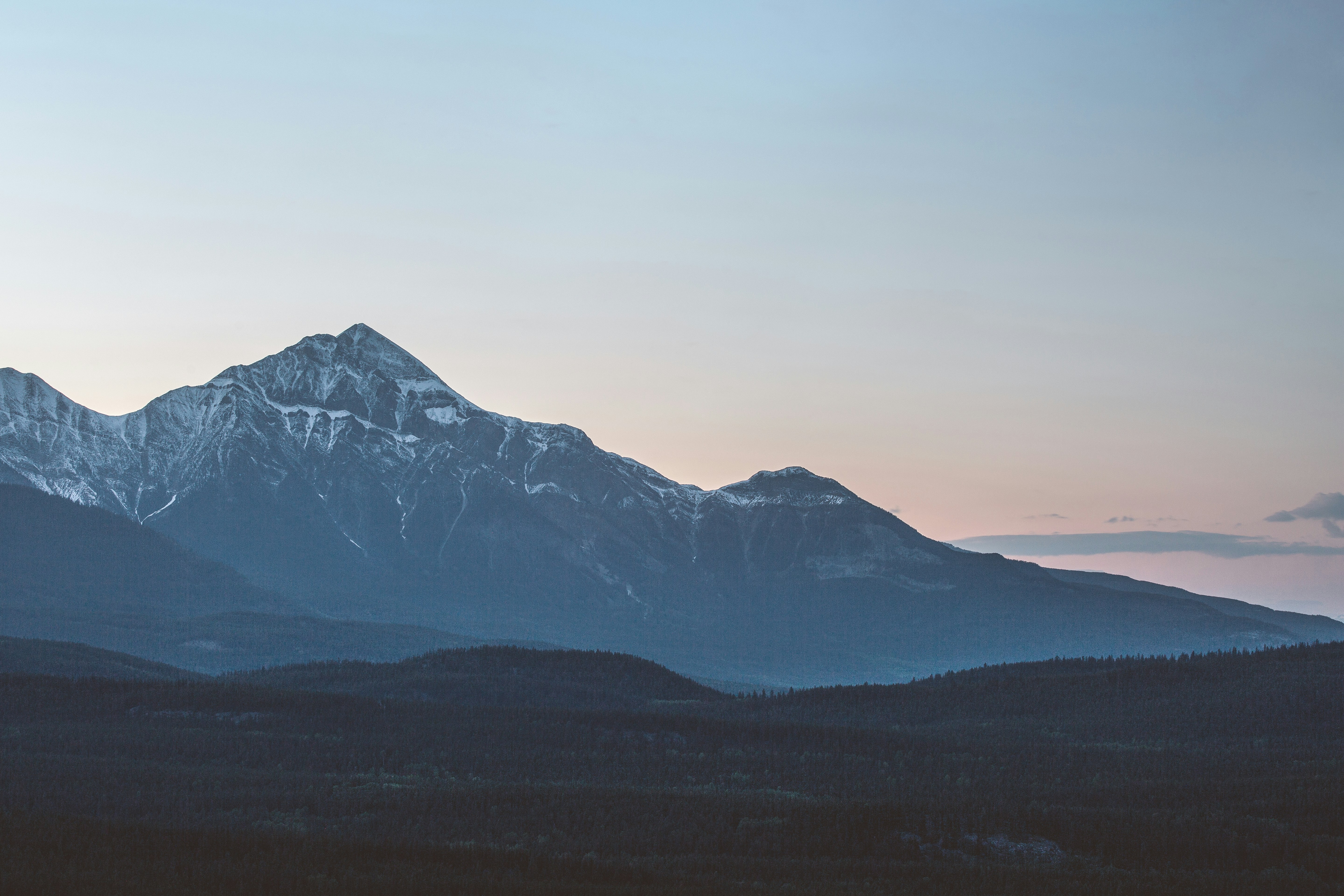 A view of a mountain range at sunset
