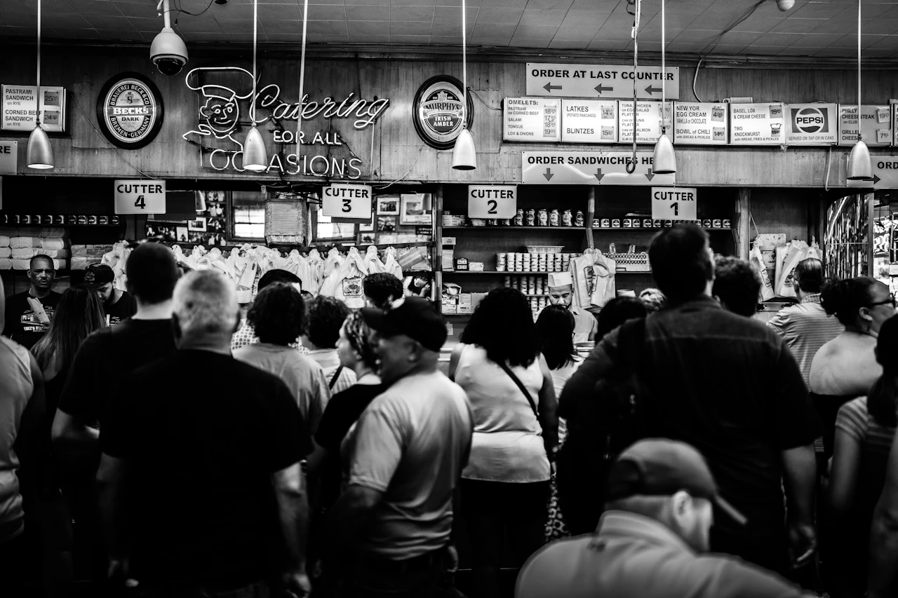 A busy retail floor, the Saturday volume that automated rules have to handle the same way they handle a slow Tuesday