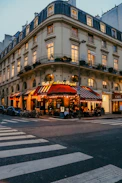A street corner with a building and a crosswalk