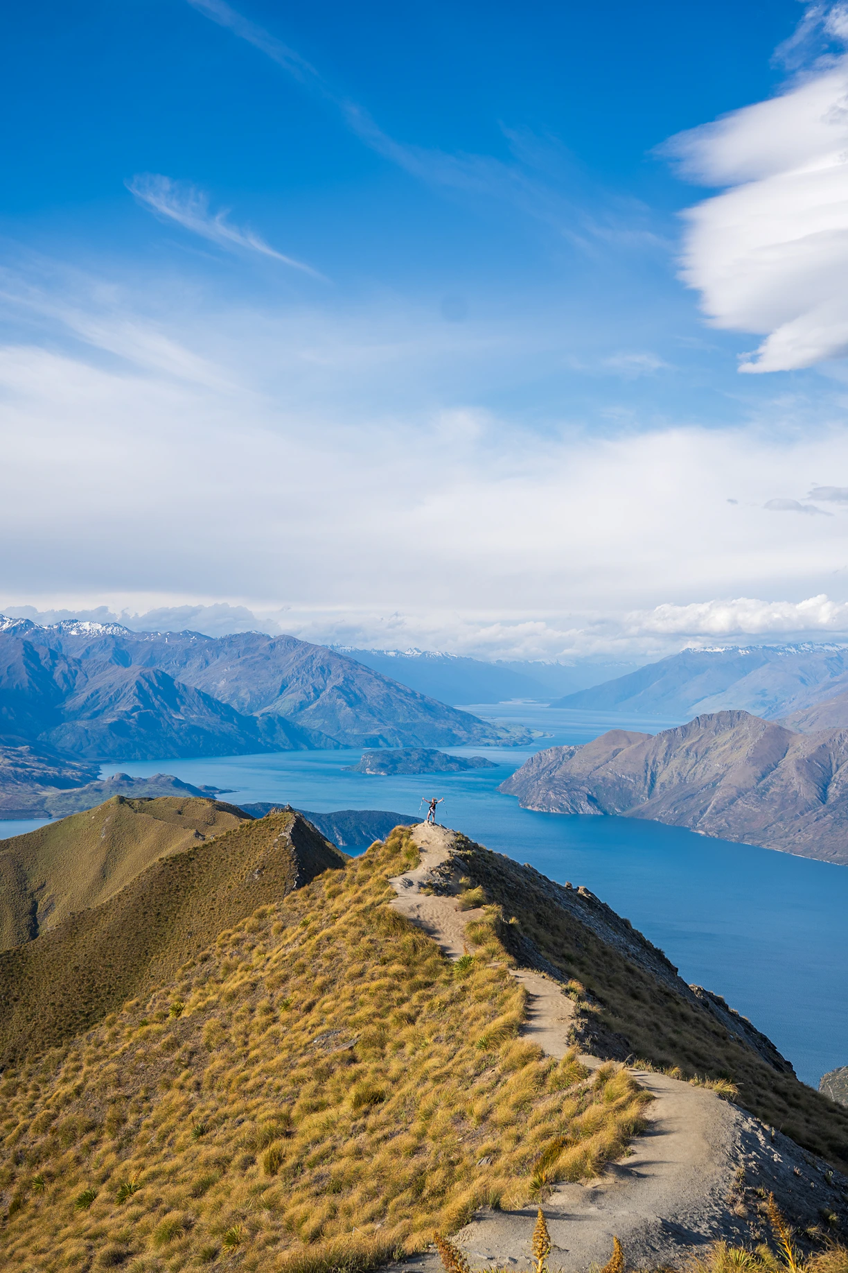 A scenic view of a lake and mountains
