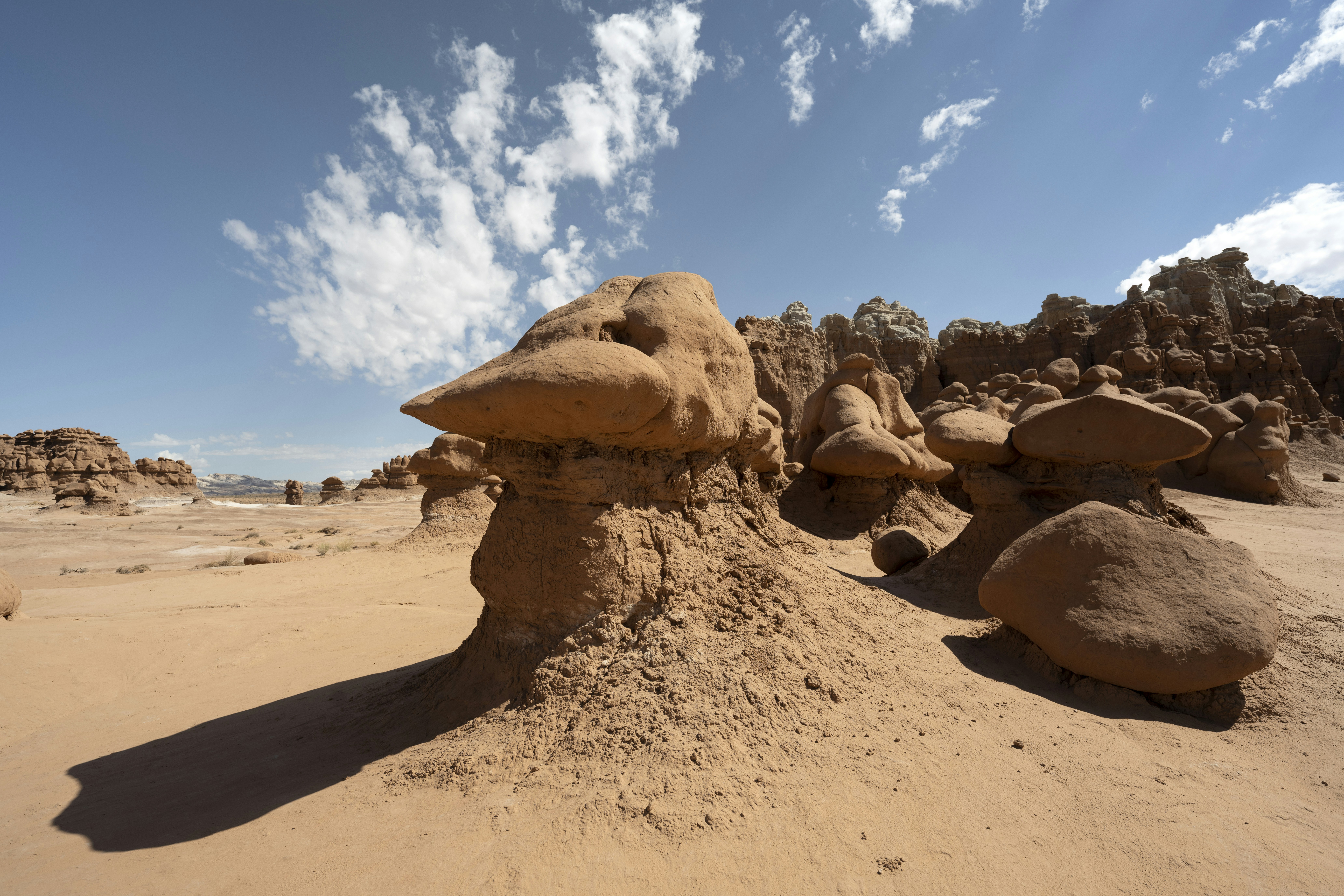A rock formation in the middle of a desert