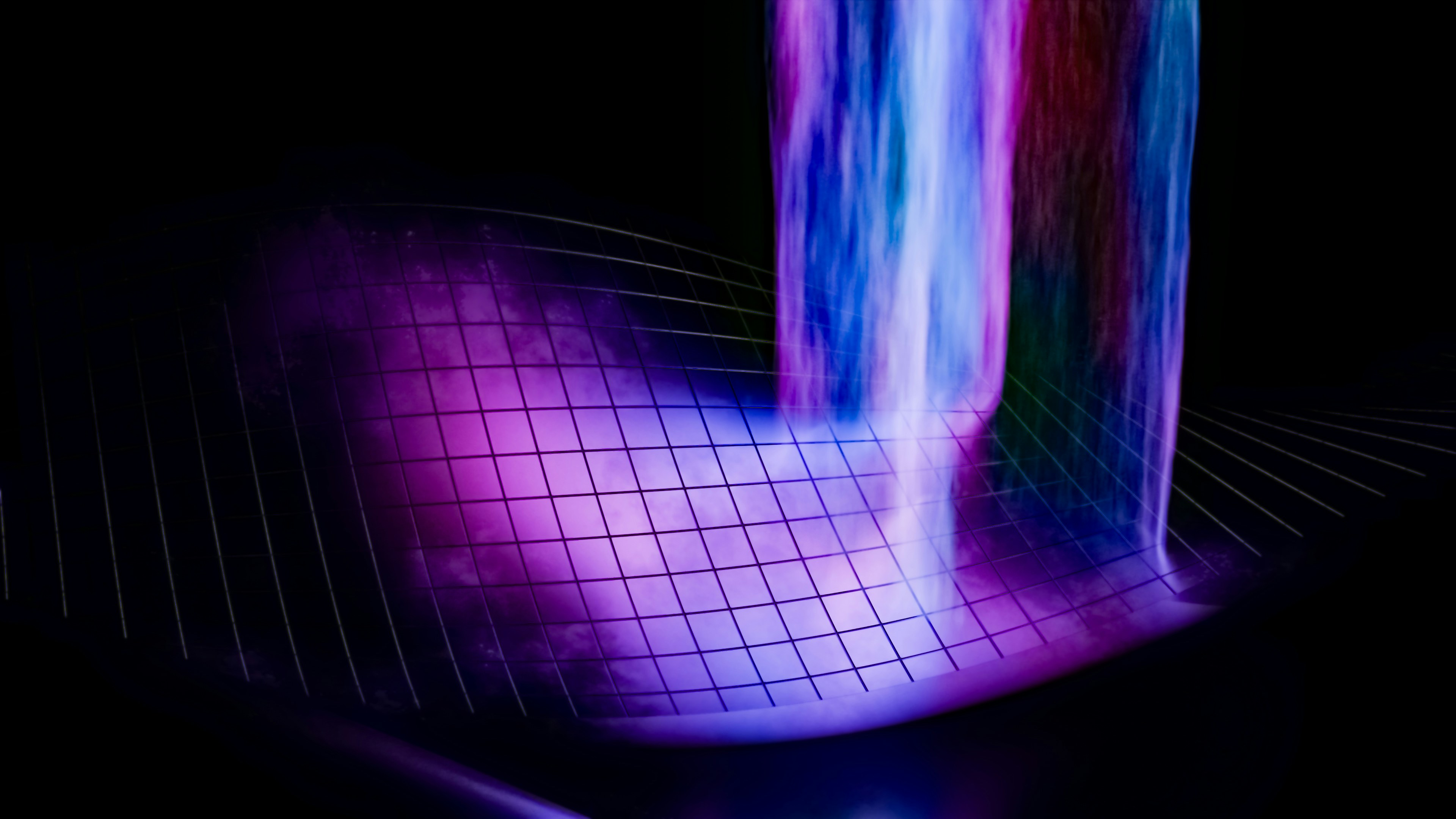 A blurry image of a tall building in the dark