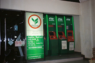 A row of green and red vending machines