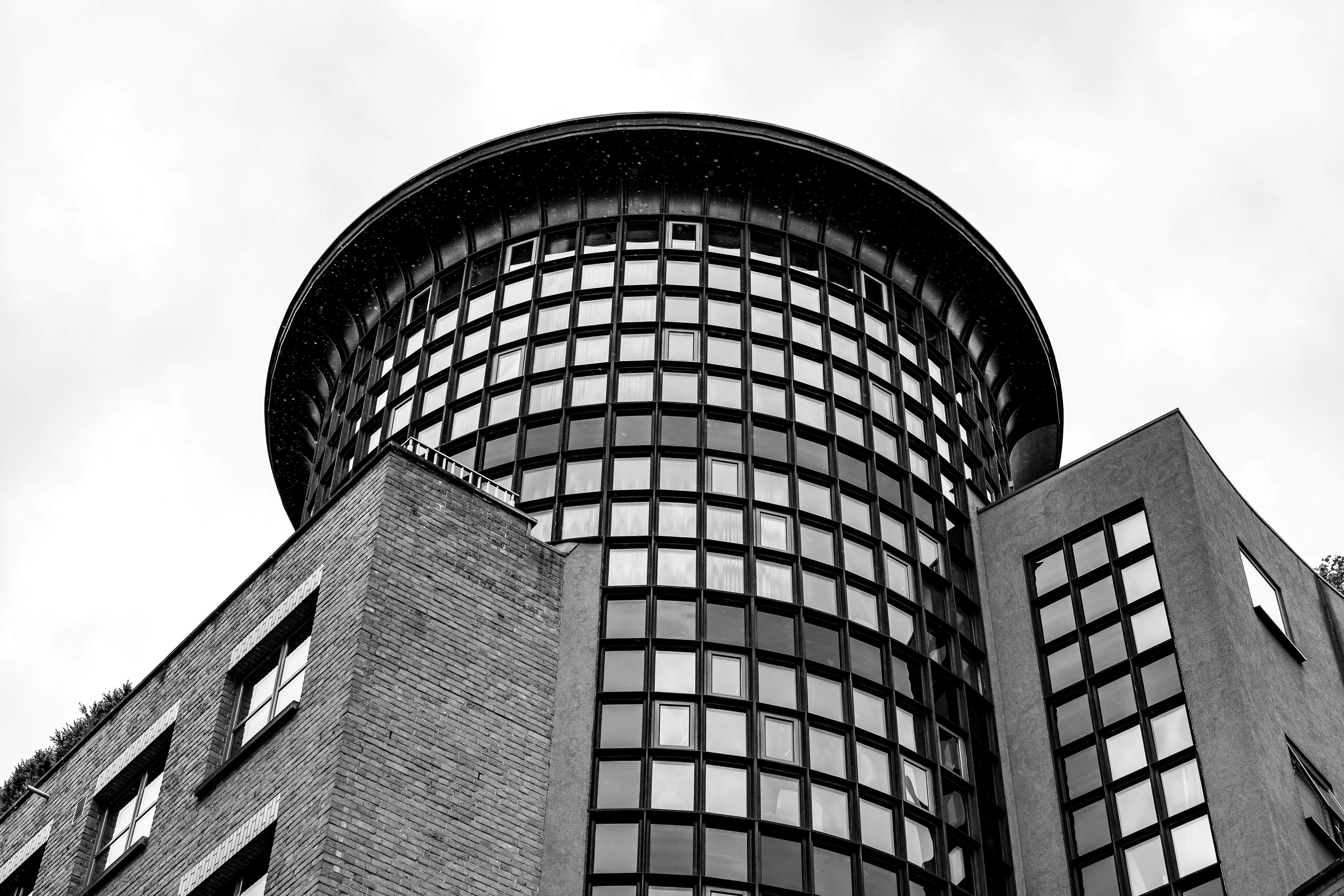 A black and white photo of a tall building