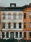A row of brick buildings sitting next to each other