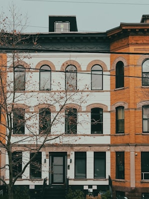 A row of brick buildings sitting next to each other