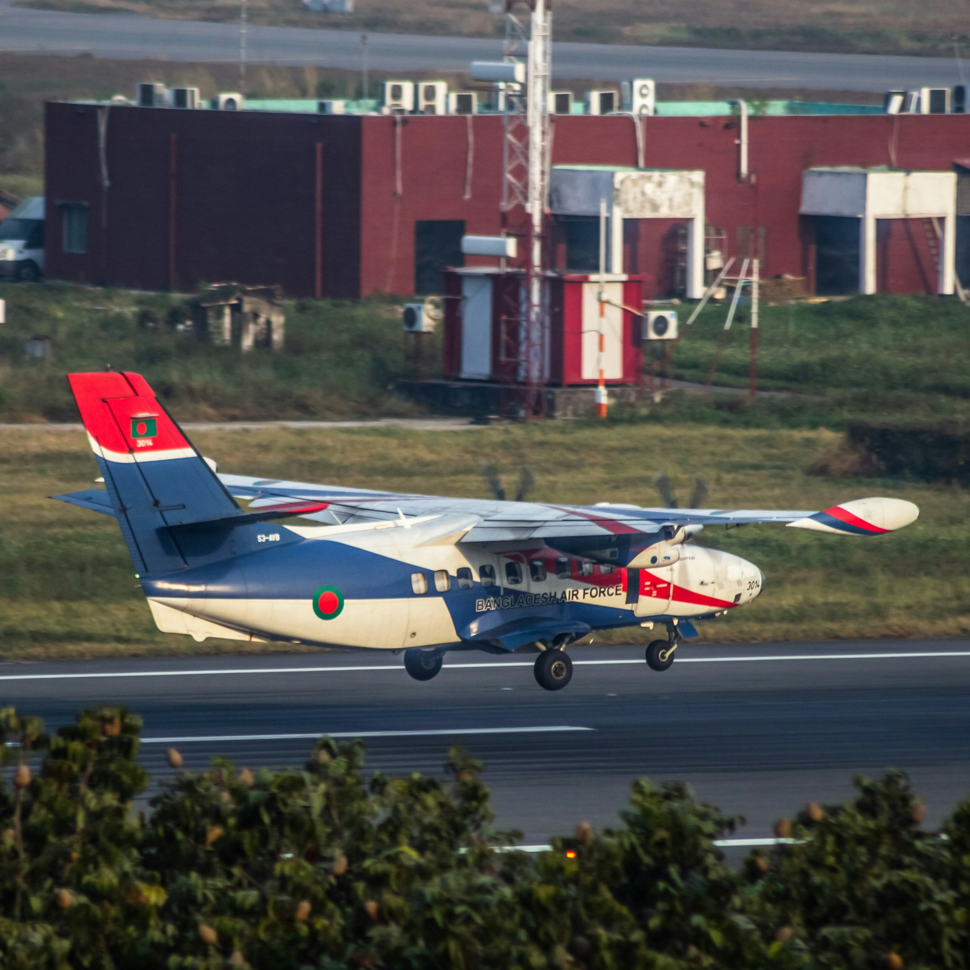 A small airplane taking off from an airport runway photo – Free ...