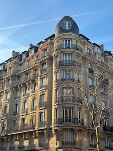 A tall building with a clock on the top of it
