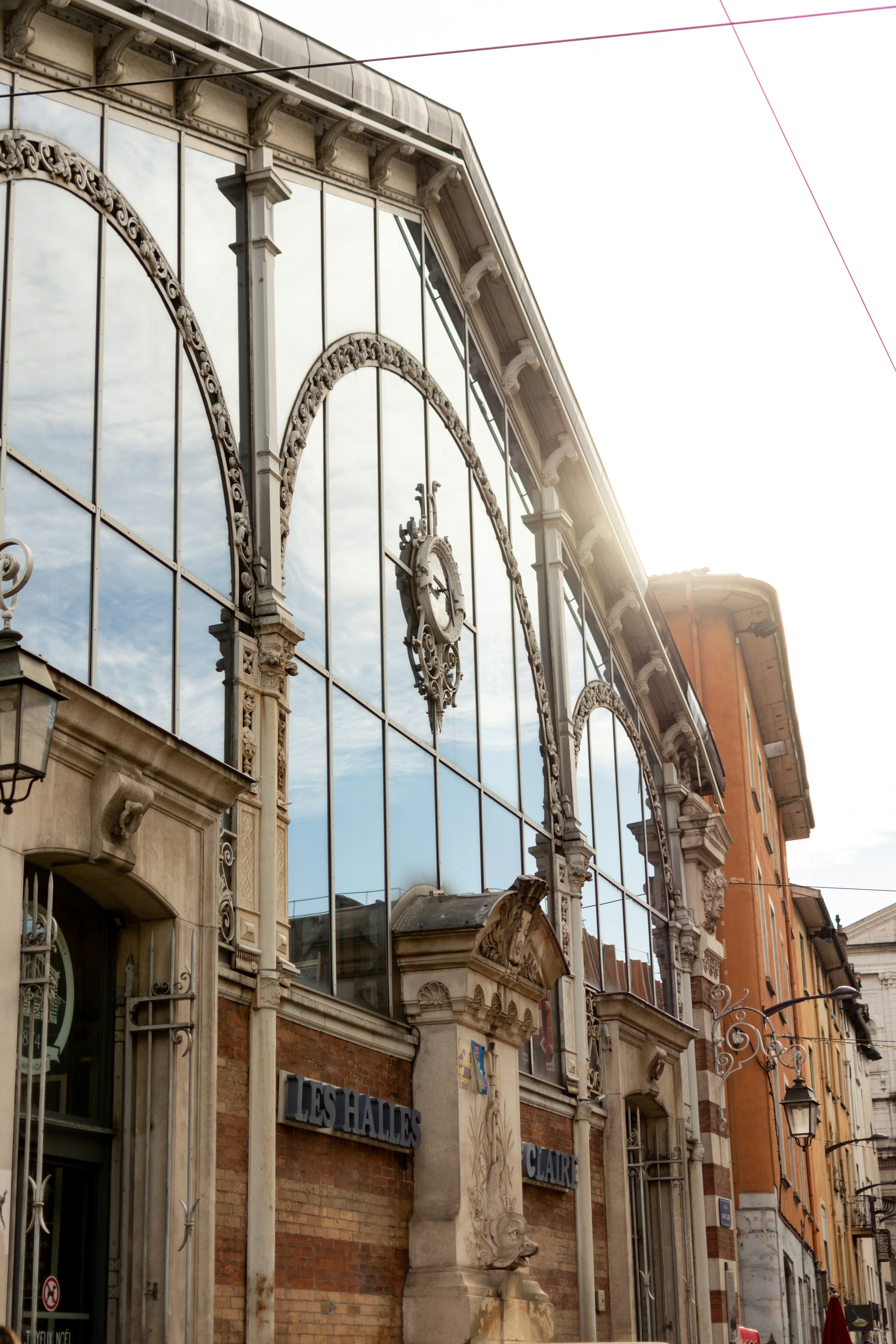 A large building with a lot of windows on the side of it