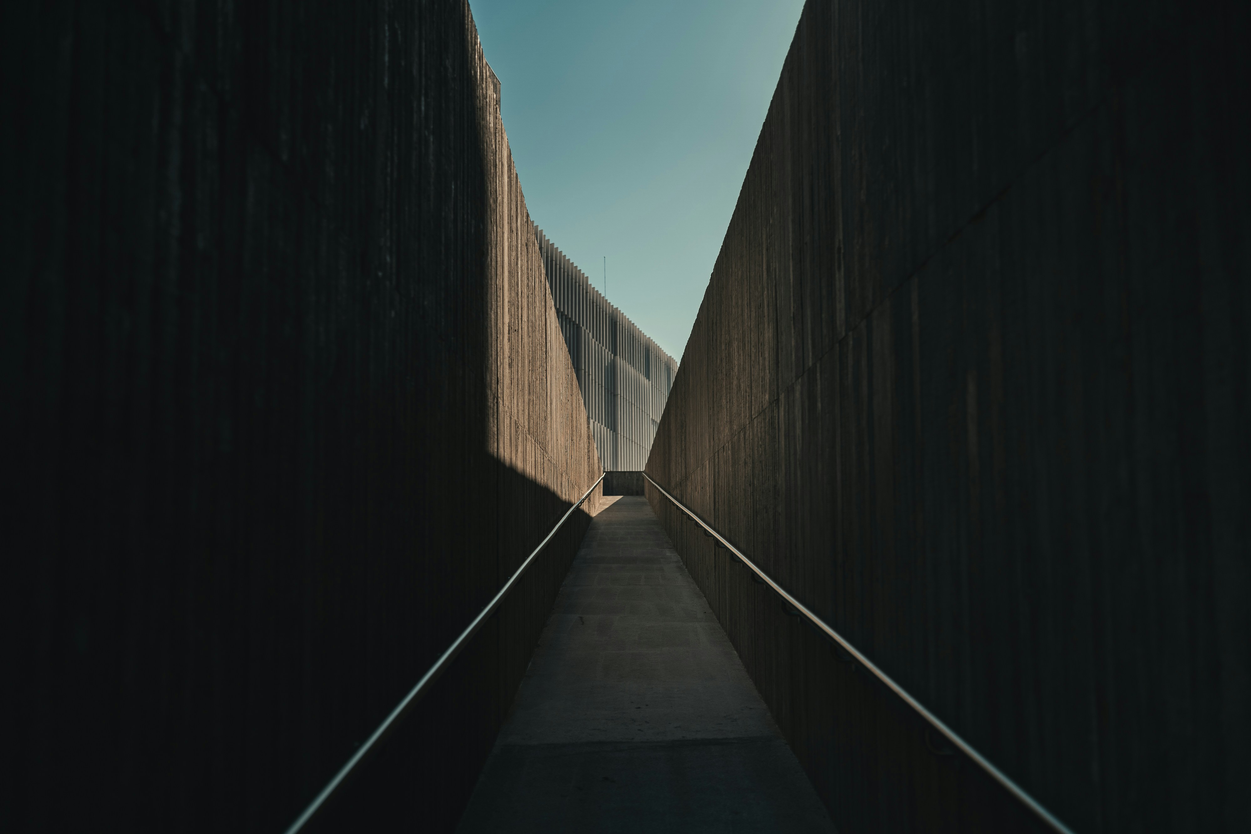 A train track going through a narrow tunnel