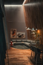 A living room filled with furniture and a wooden floor