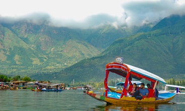 A group of people riding on the back of a boat