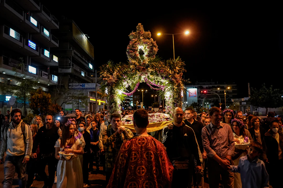 A night procession with a flower-covered canopy (illustration)