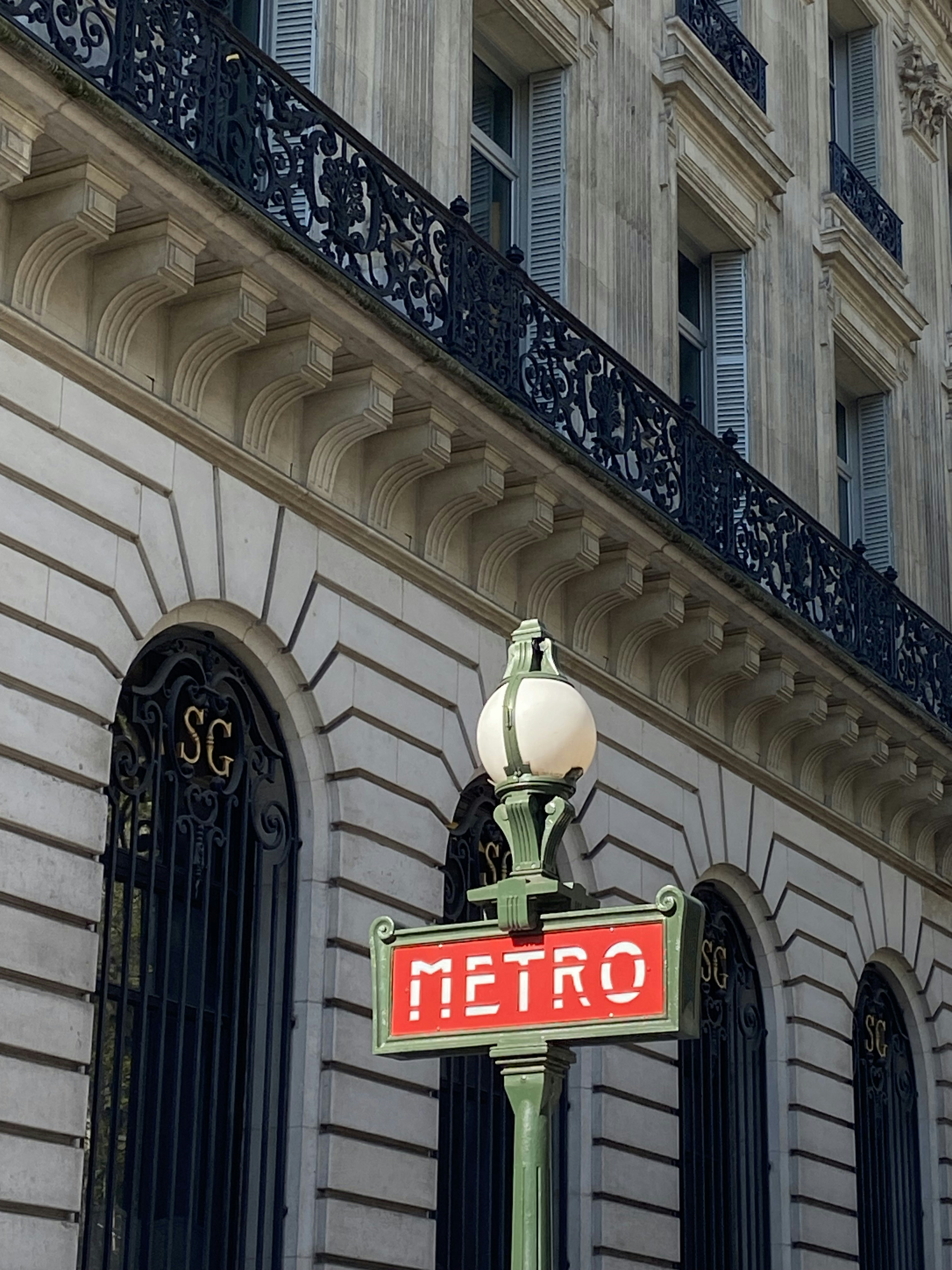 A street sign in front of a building