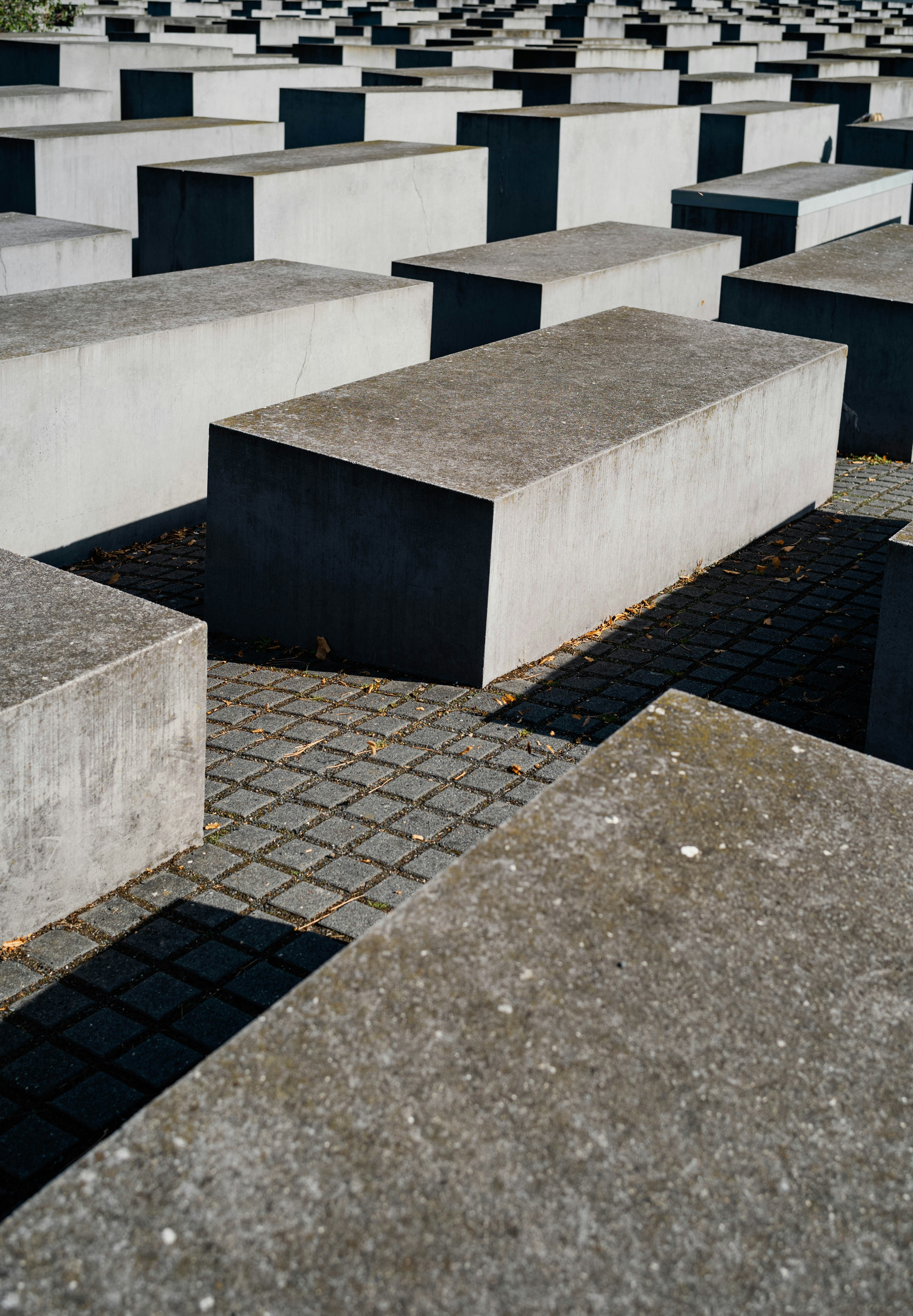 A bunch of cement blocks sitting on top of a cement floor