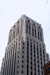 A very tall building with a sky background