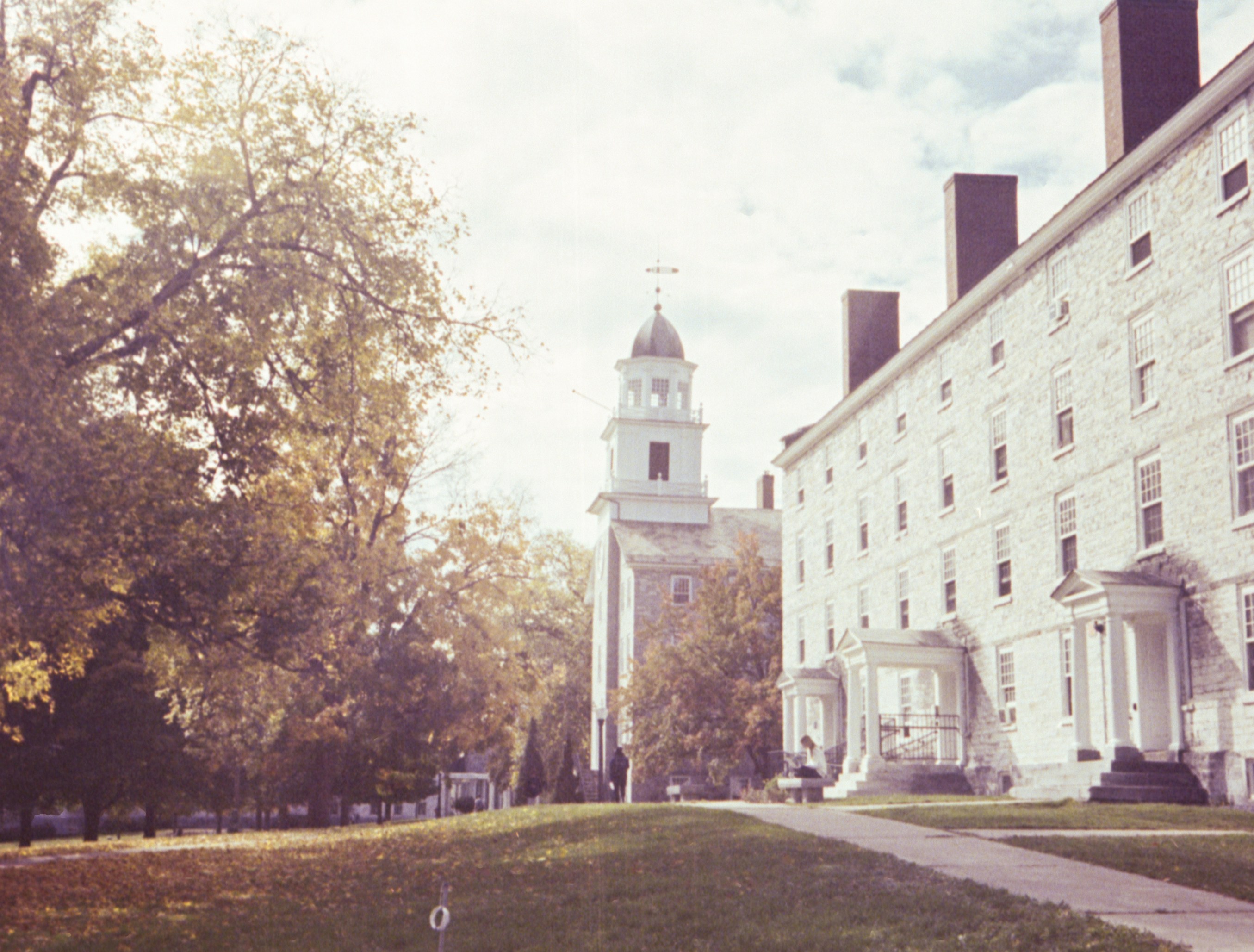 A large white building with a clock tower