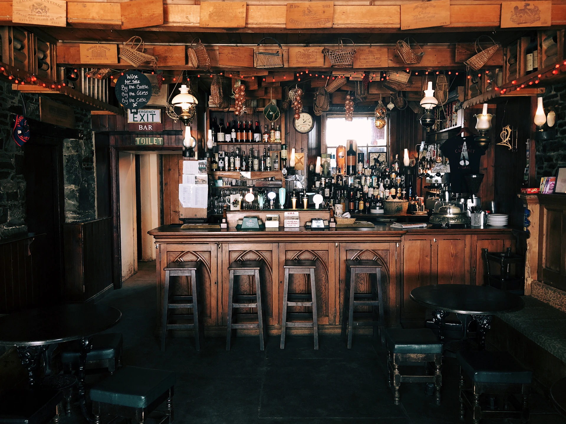 A bar with a bunch of stools in front of it