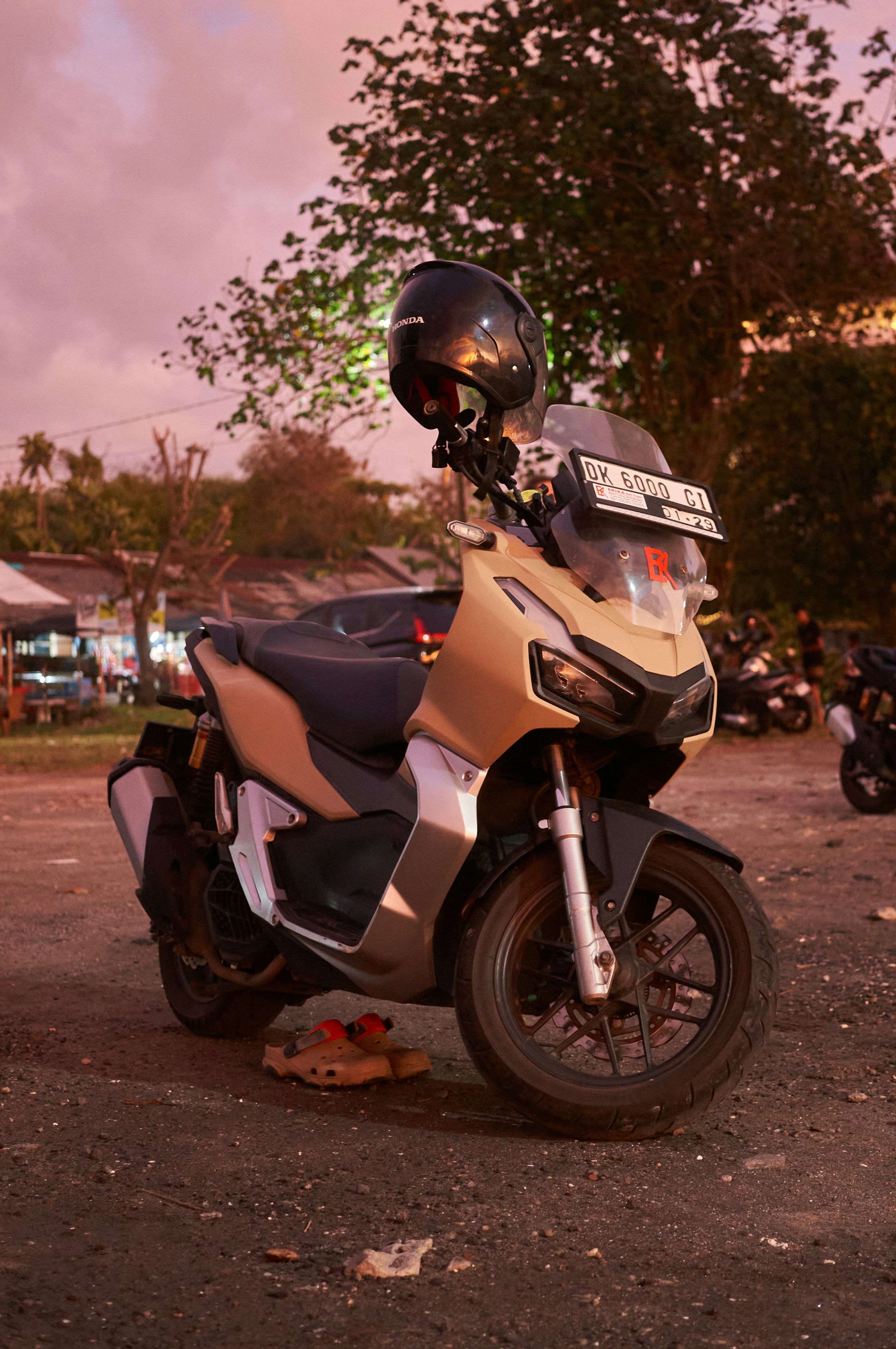 A motorcycle parked on the side of the road