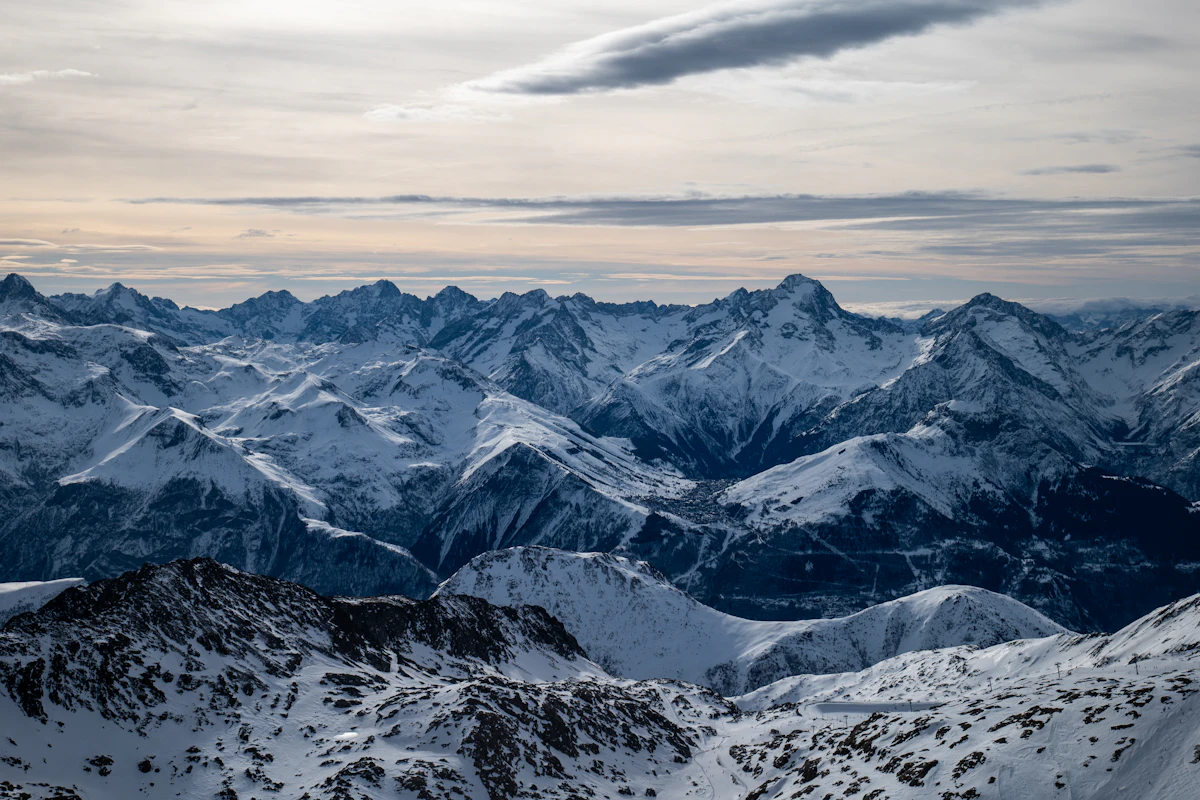 Snow-covered peaks seen from high up at Alpe d'Huez