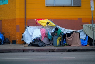 A group of tents sitting on the side of a road