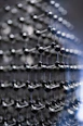 A close up of a metal structure with many balls