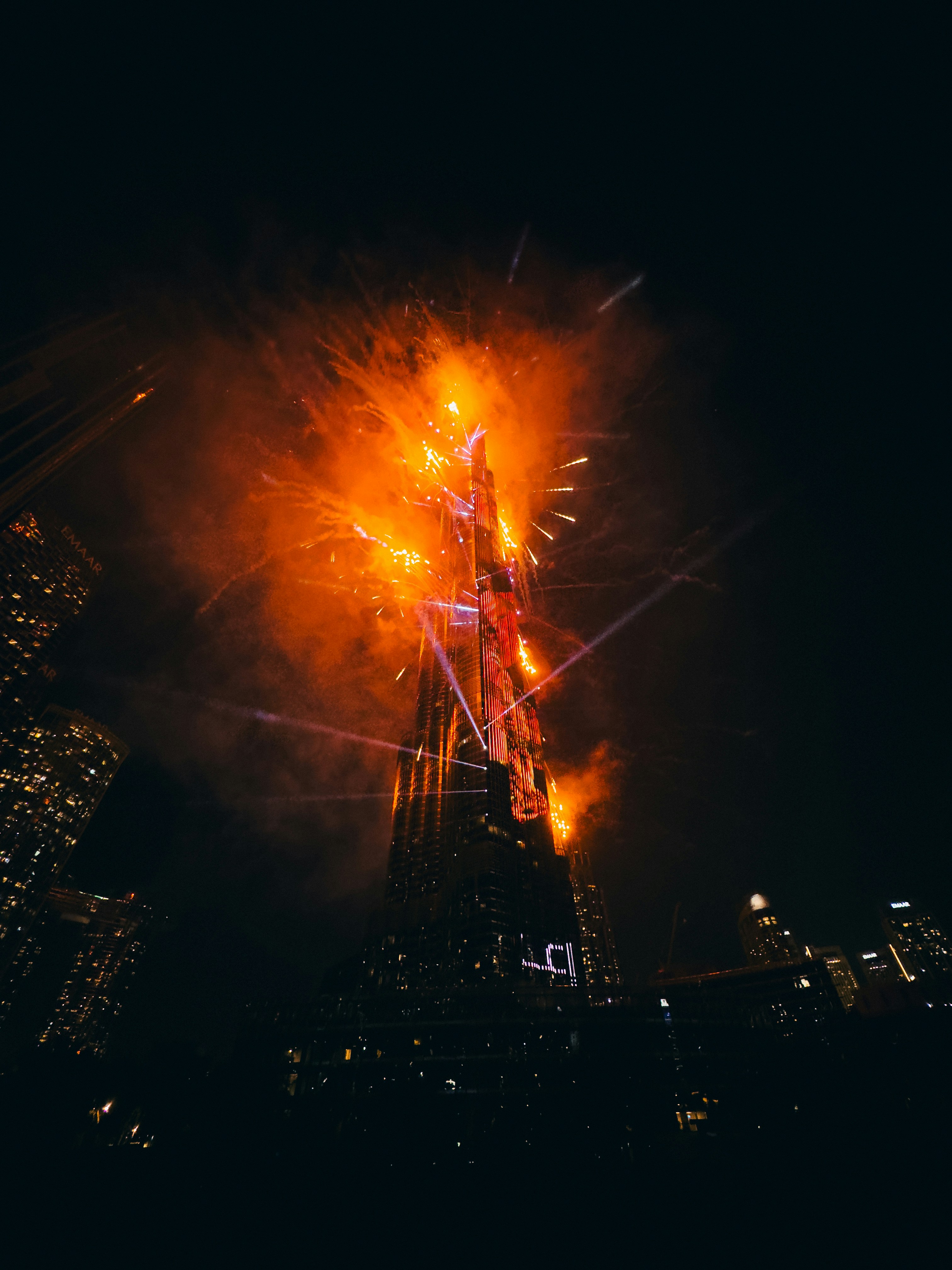 A very tall building with a lot of lights on it