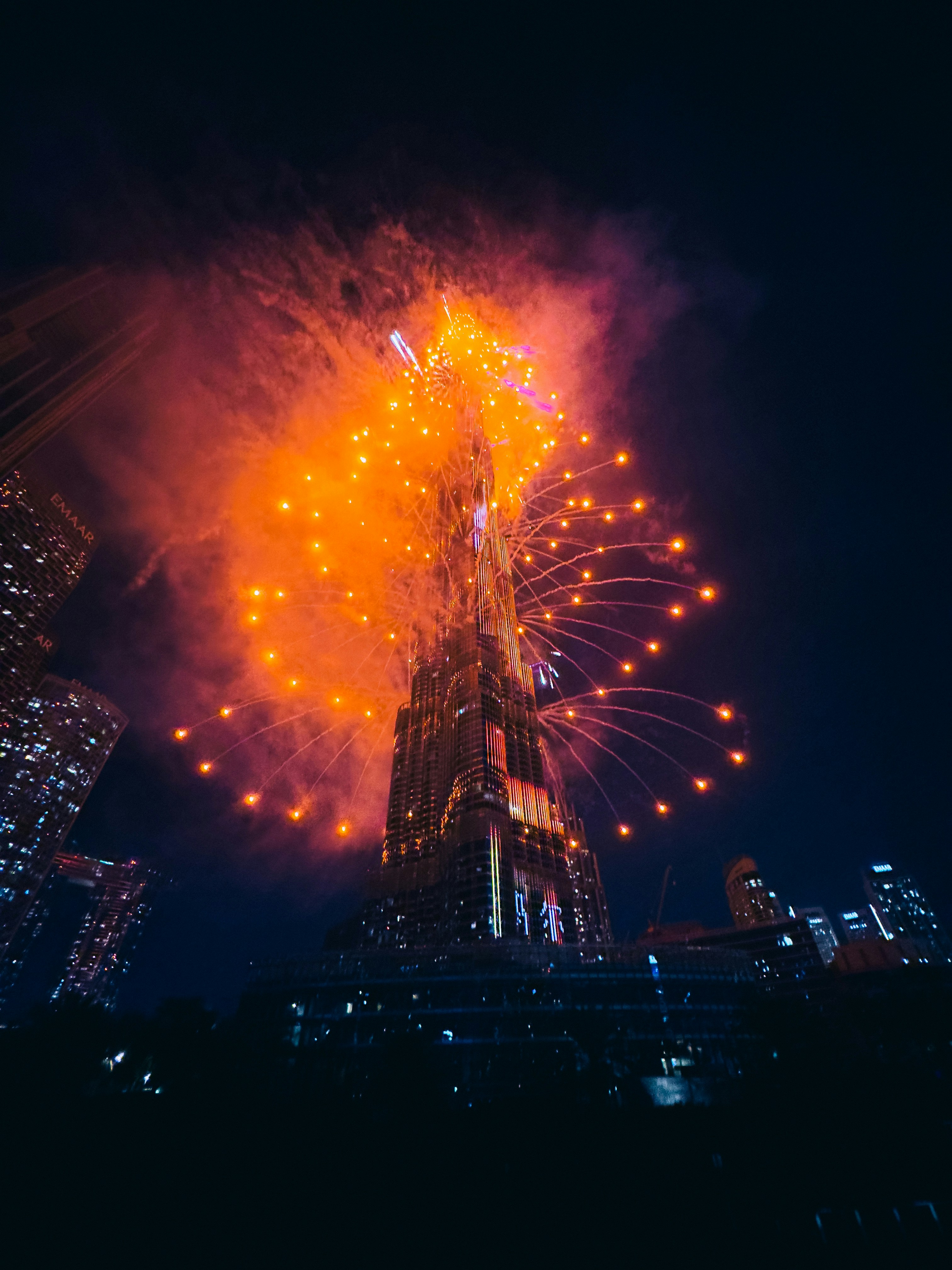 A large fireworks display in the night sky