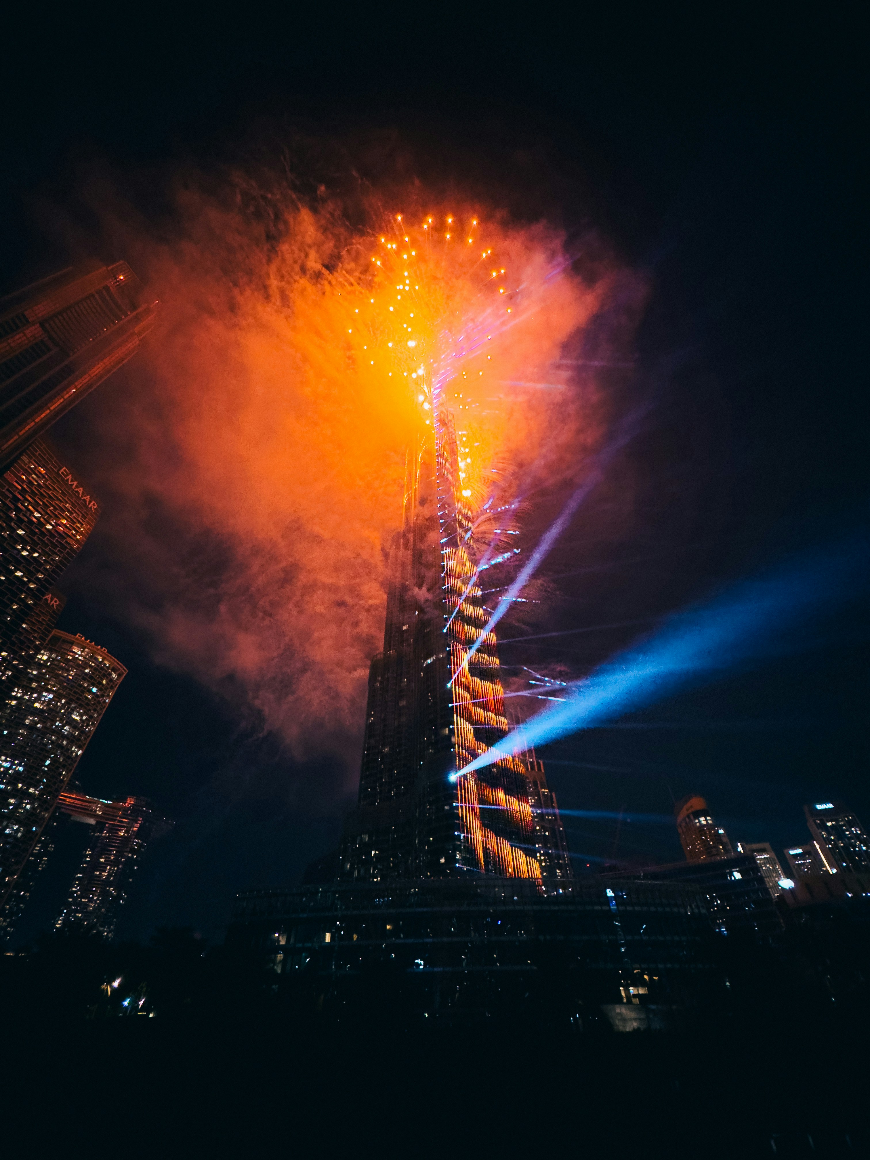 A very tall building with a lot of lights on it