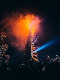 A very tall building with a lot of lights on it