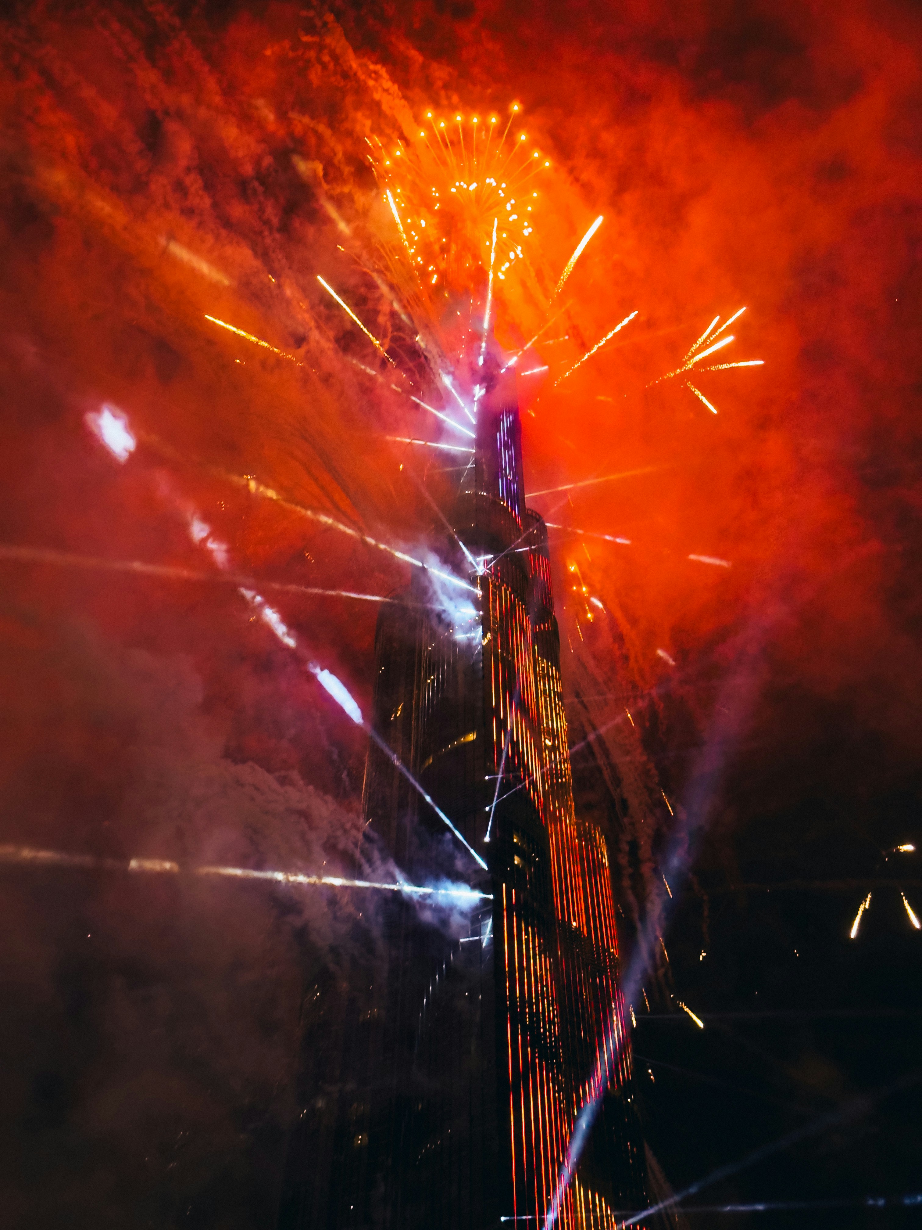 A large fireworks display in the night sky