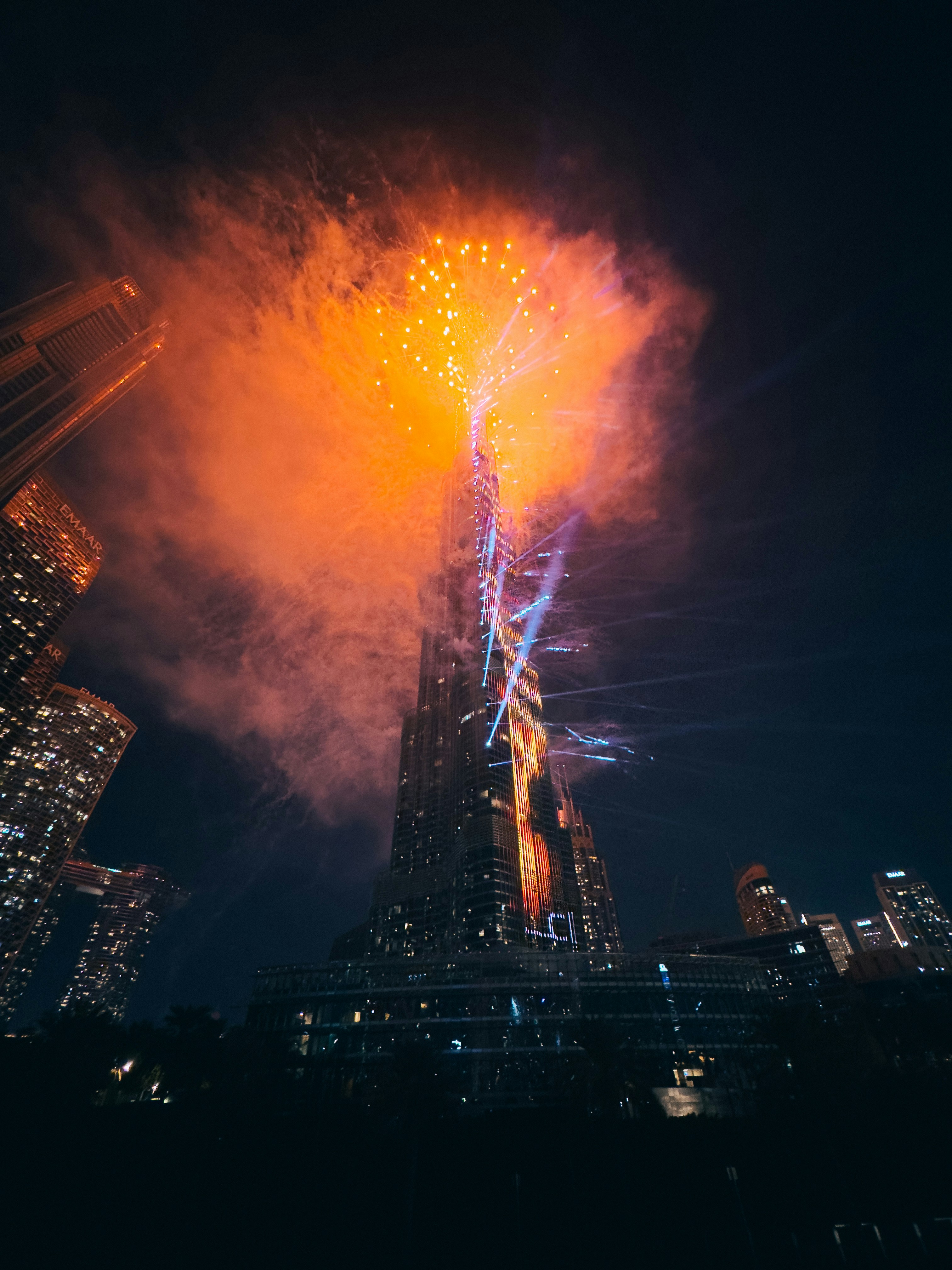 A very tall building with a lot of lights on it