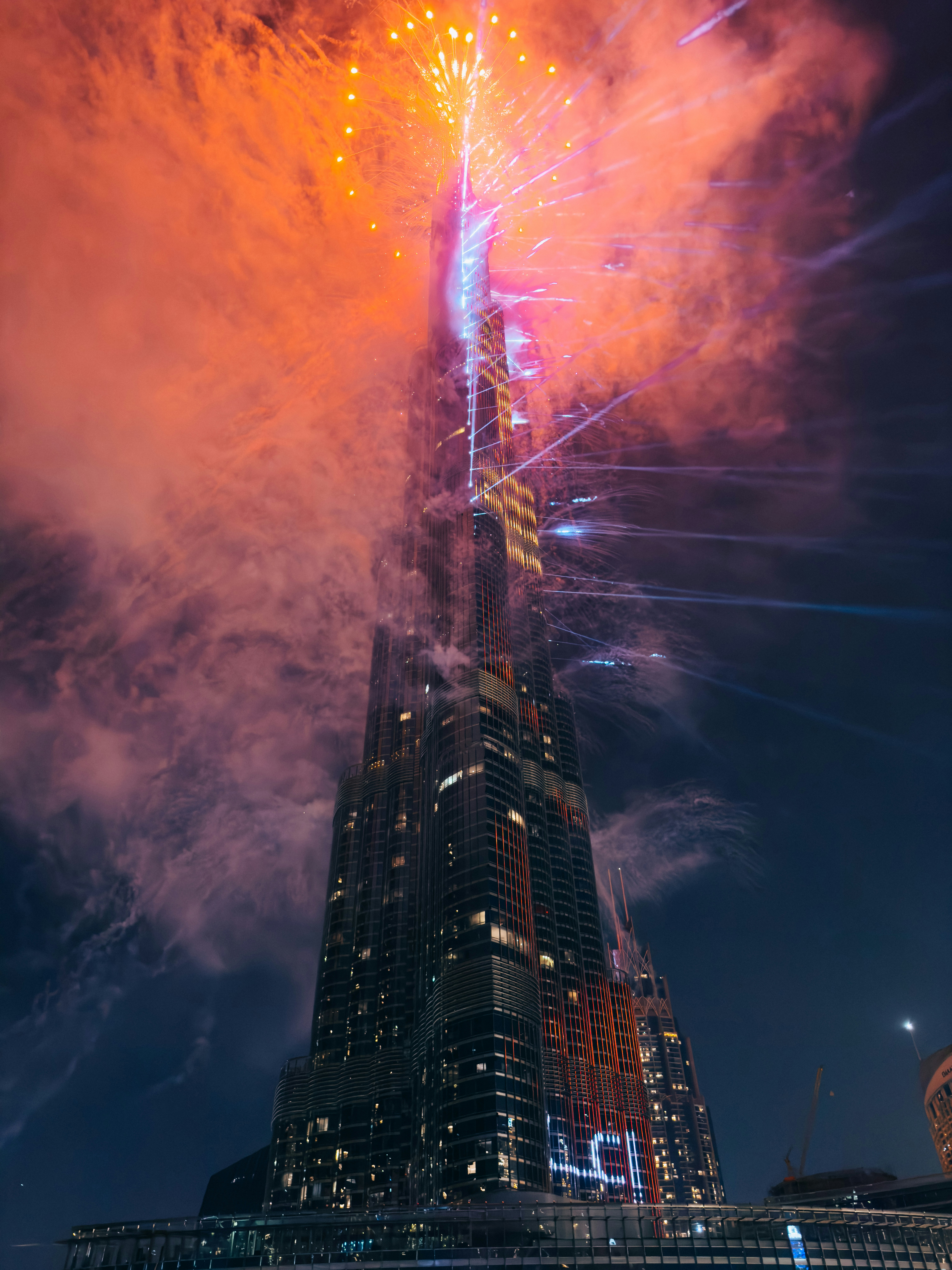 A very tall building with a lot of lights on it