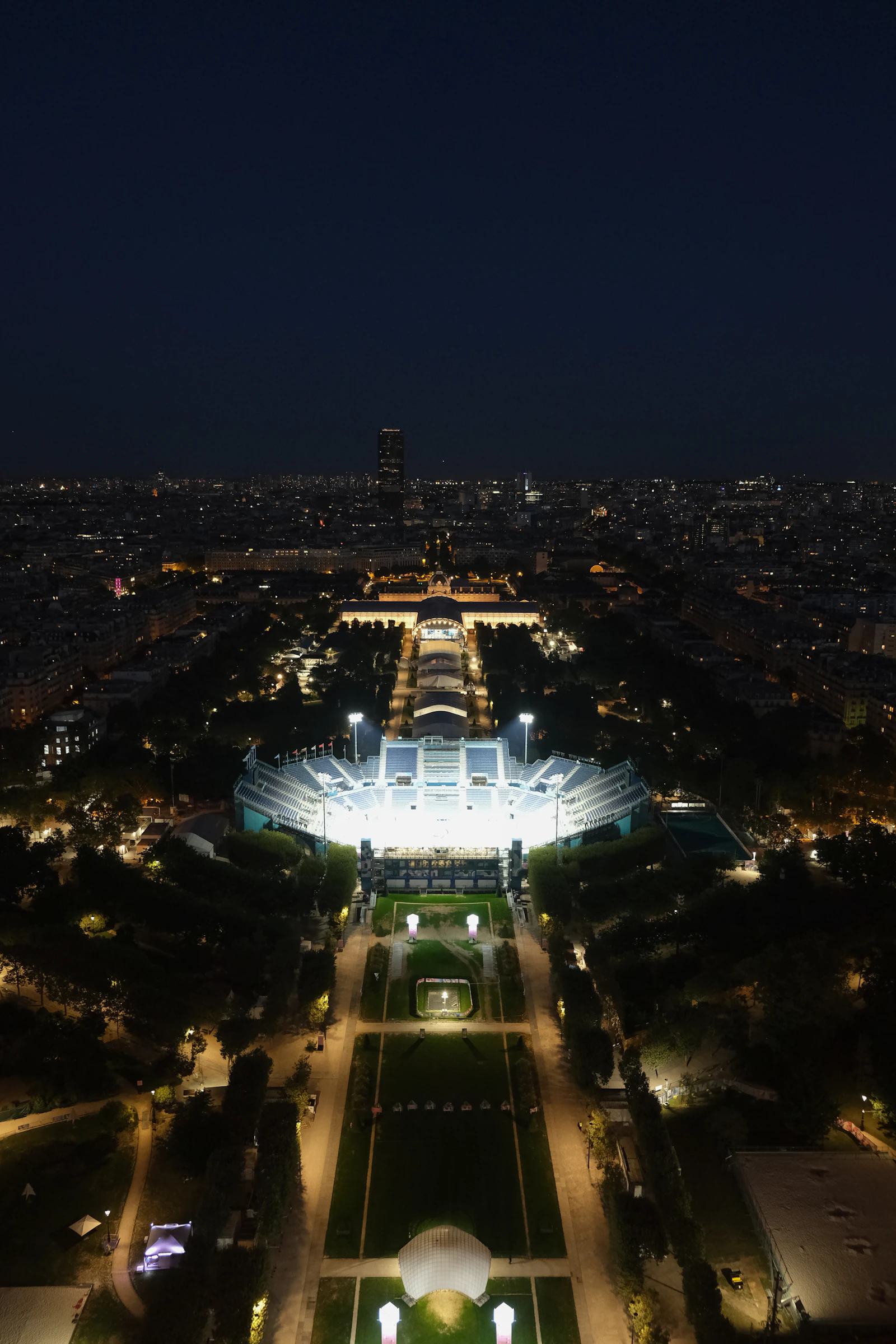 The Eiffel Tower illuminated against the night sky in Paris, France