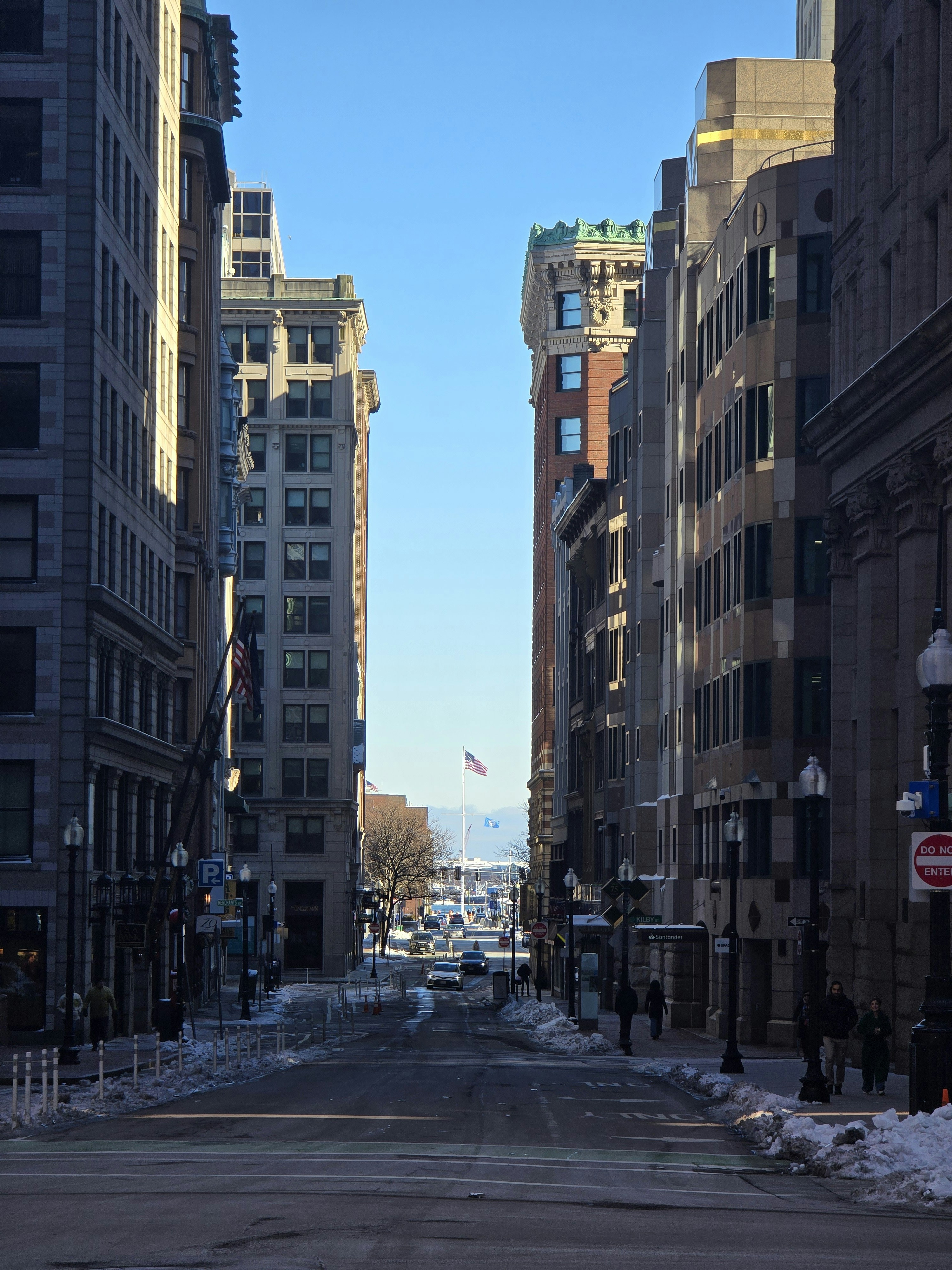A city street with snow on the ground