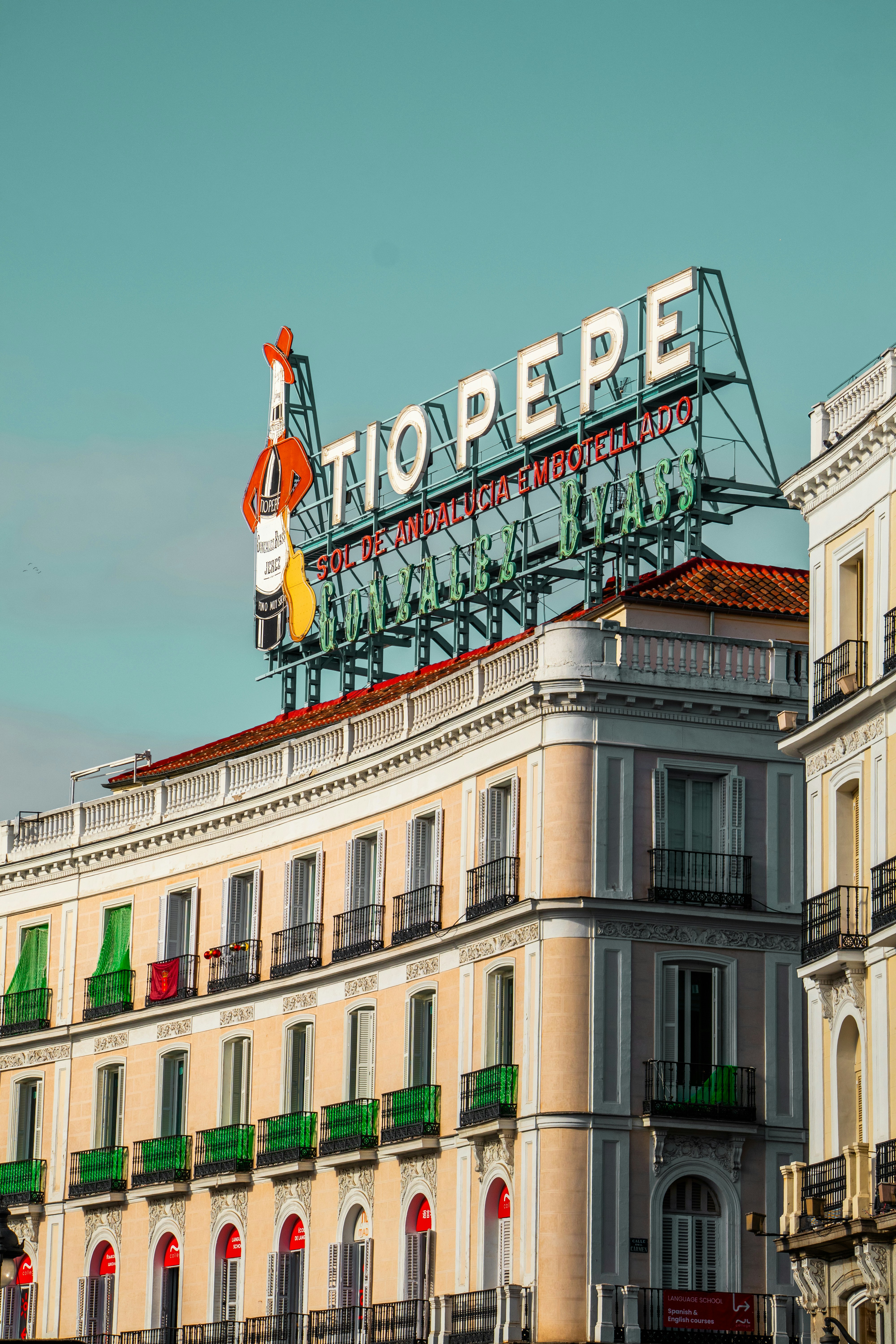 A large building with a sign on top of it