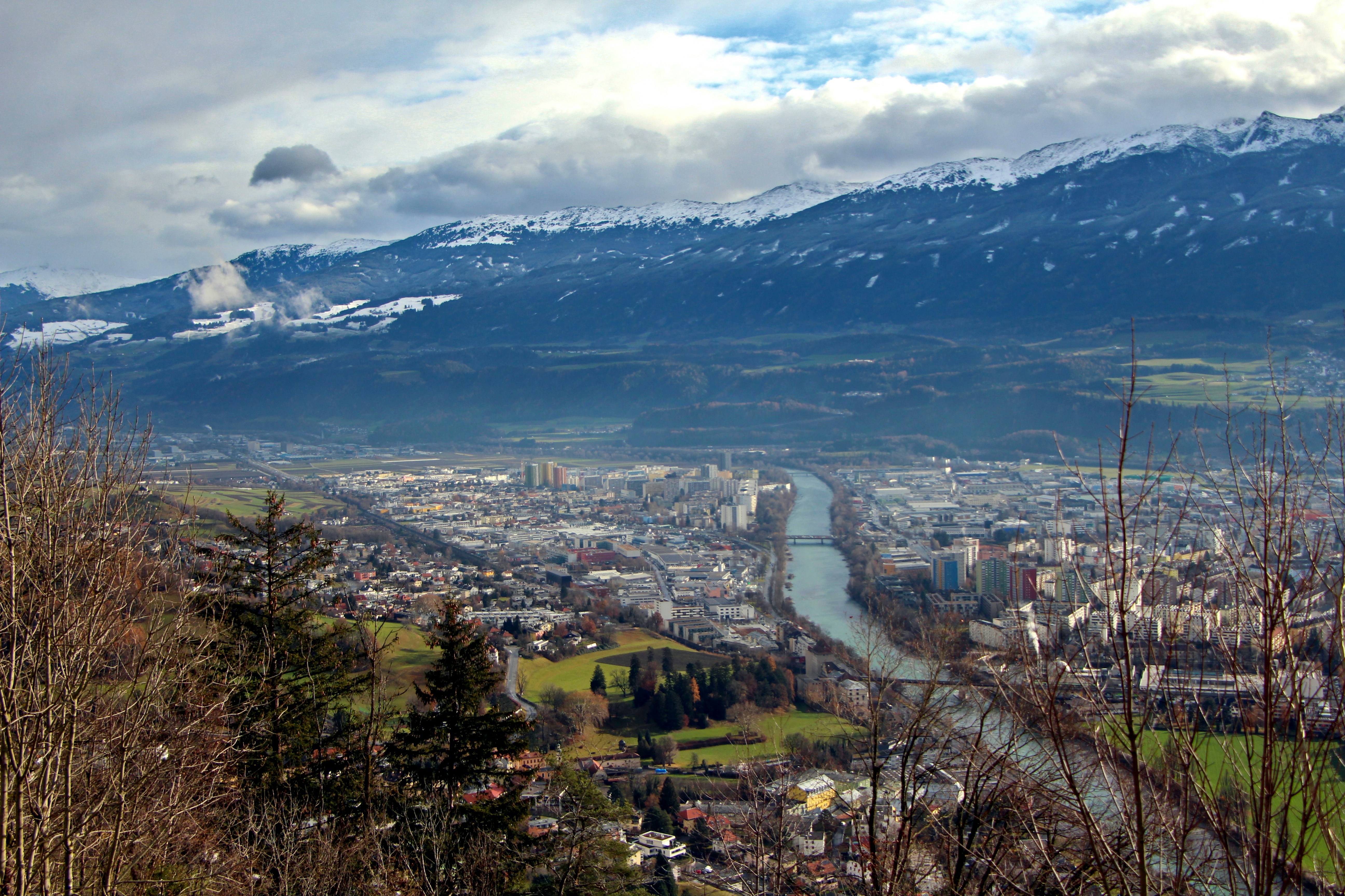 A view of a city with mountains in the background