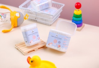 A yellow rubber duck sitting on top of a table