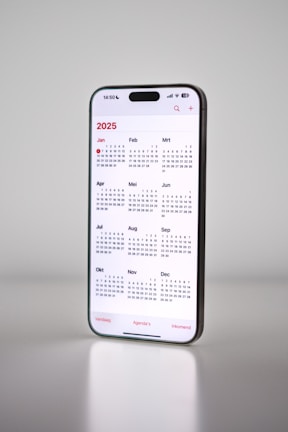A phone with a calendar on the back of it
