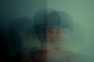 A blurry photo of a woman and a man